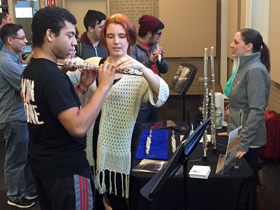 Students try North Bridge flutes at "Windy City Flutes" after the Vandercook class