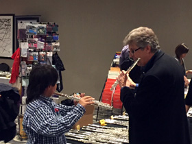 Paul Edmund-Davies improvises with a young budding student at the Chicago Flute Fair
