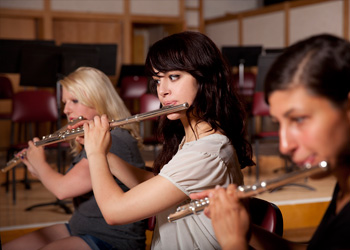 Girls playing flutes