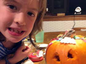 April carves her first pumpkin